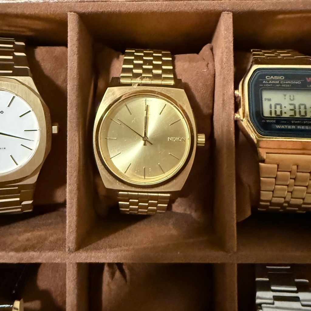 Nixon Gold Luxury Watch With Analog Display And Textured Bracelet